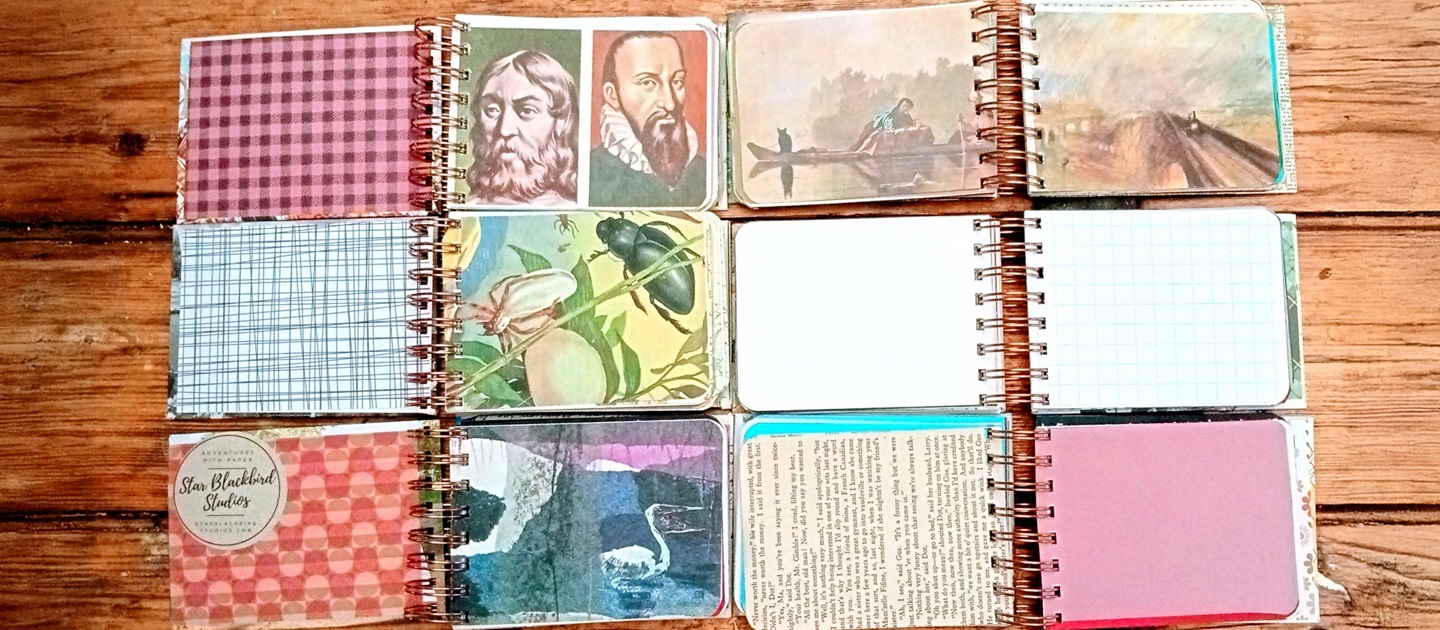 Flat lay of bespoke journals made by Star Blackbird Studios.