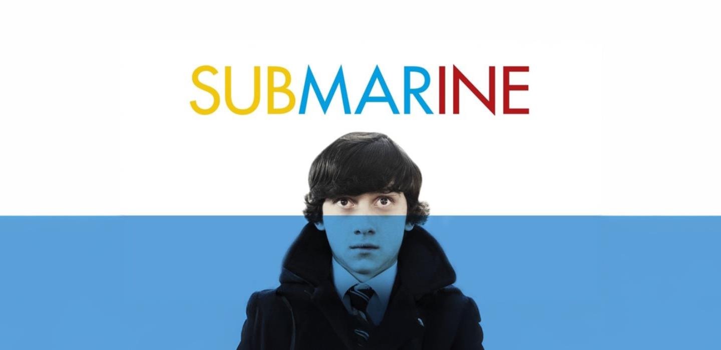Film promotion for the Film Submarine, teenage boy with blue transparency reaching eye level.