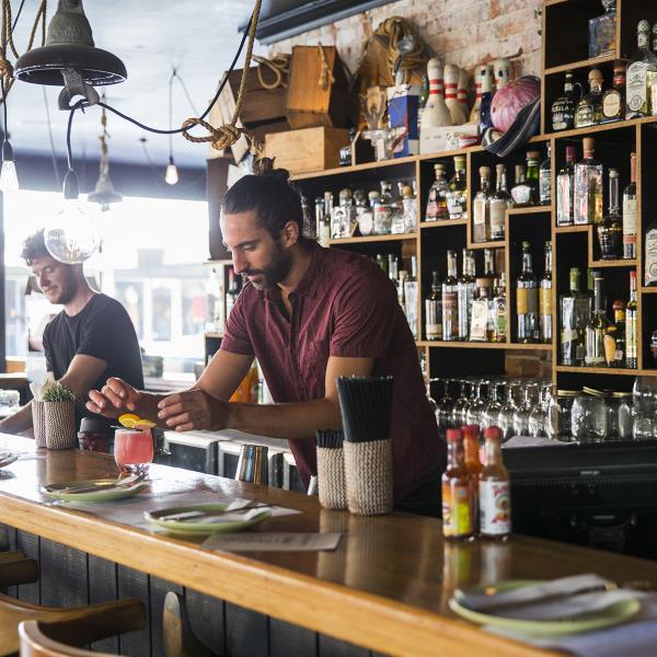 Barmen making drinks at La Cholita