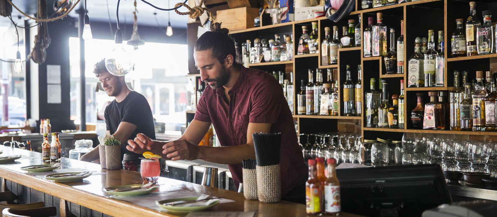 Barmen making drinks at La Cholita