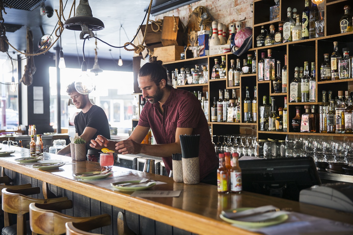 Barmen making drinks at La Cholita