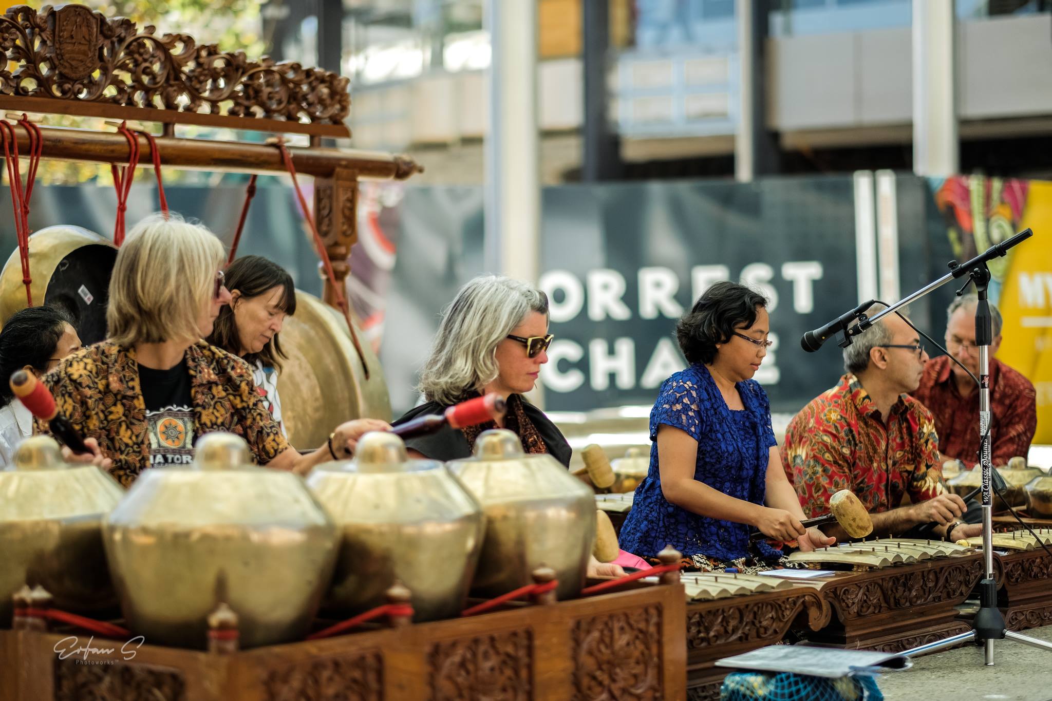 People serving food at the Summer Time Festival