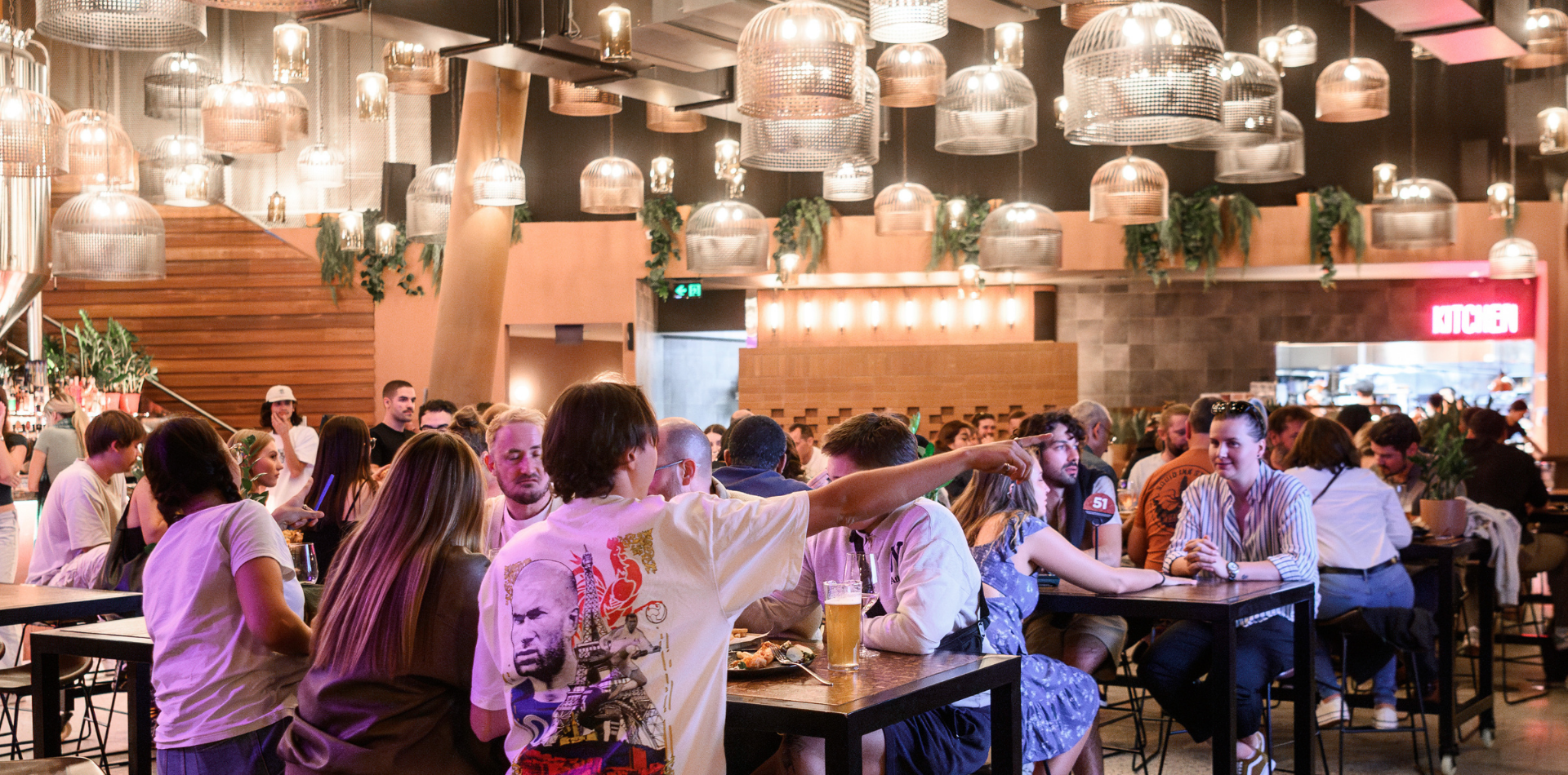 people sitting at stories pourhouse