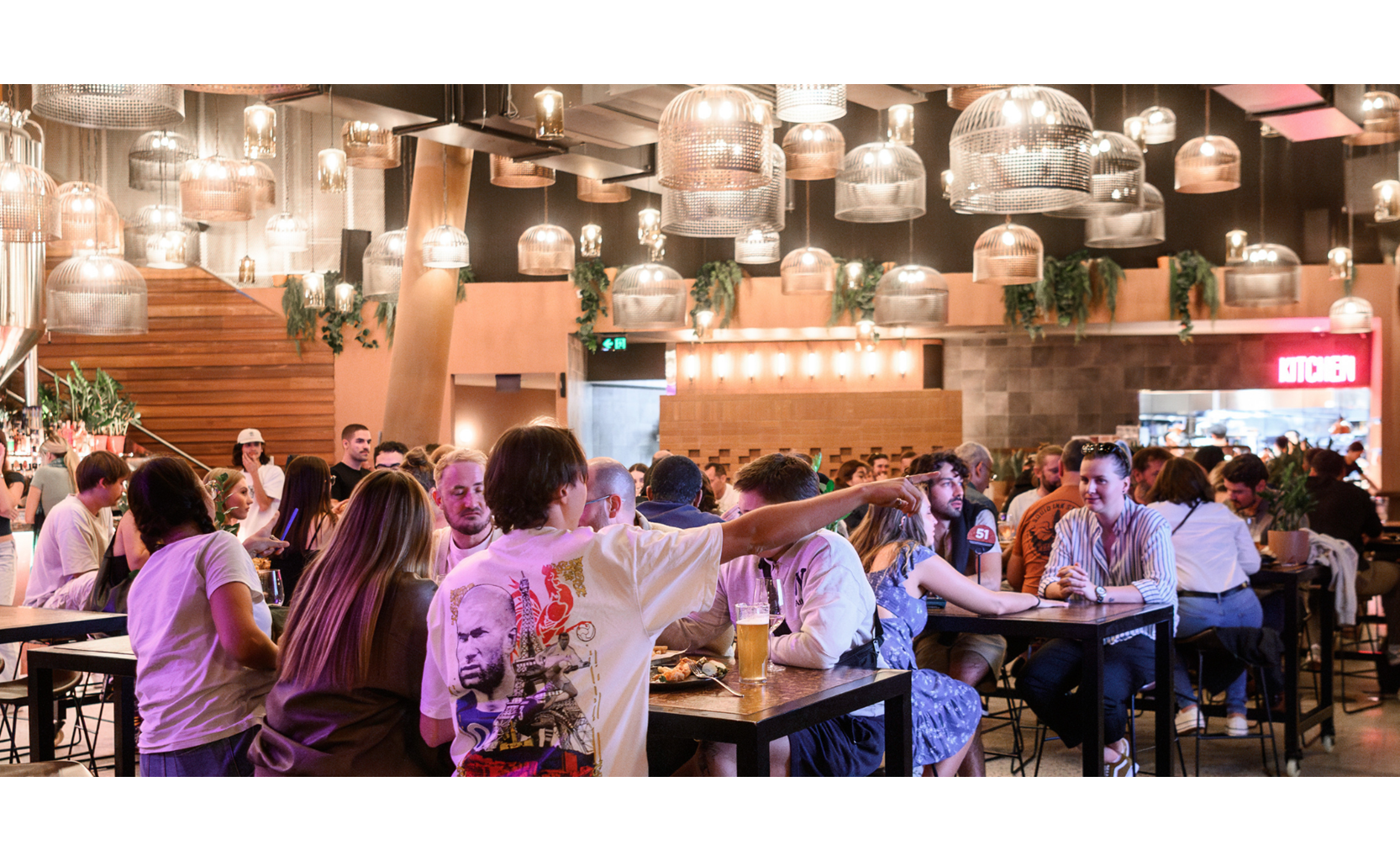 people sitting at stories pourhouse