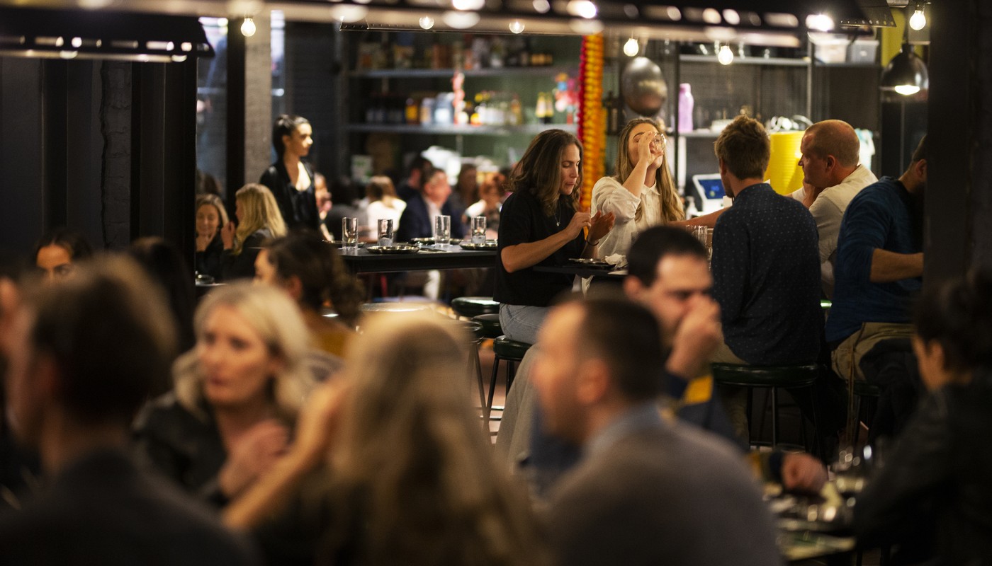 people having drinks at a bar
