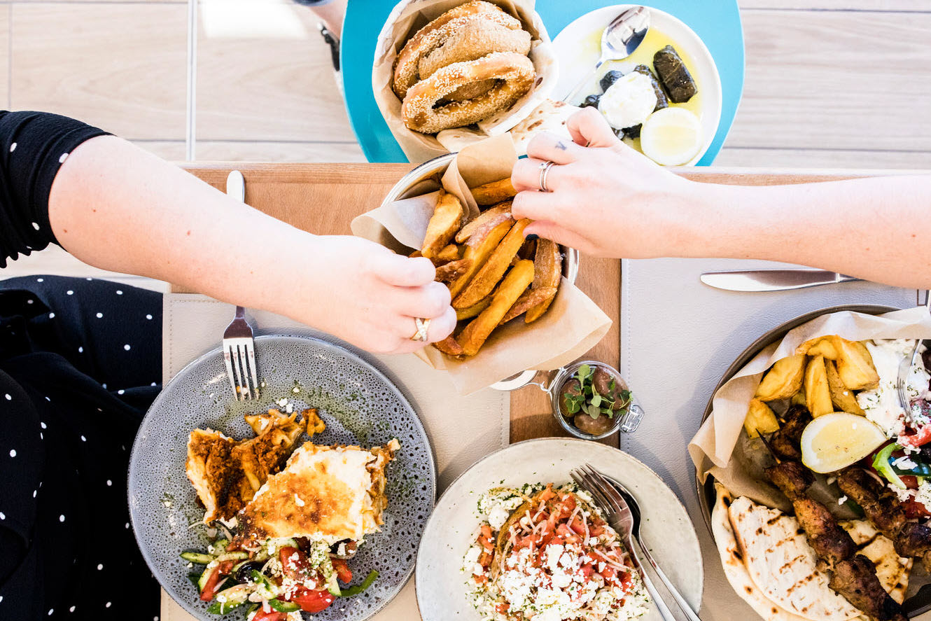 Birds eye view of selection of Greek food 