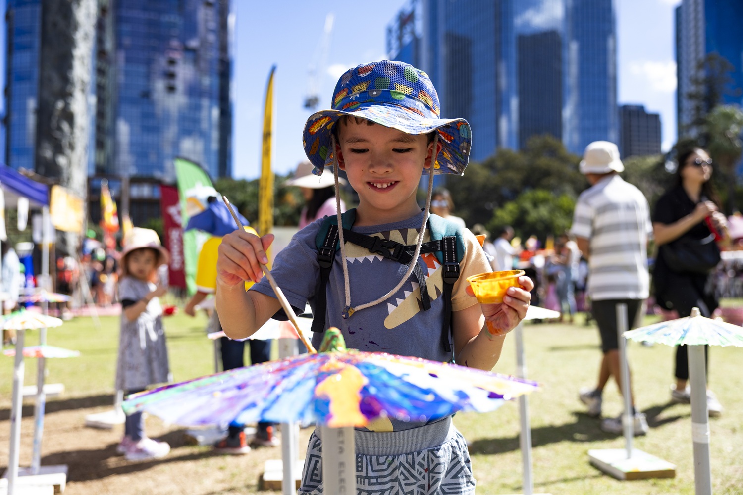 Child at a community event at Supreme Court Gardens