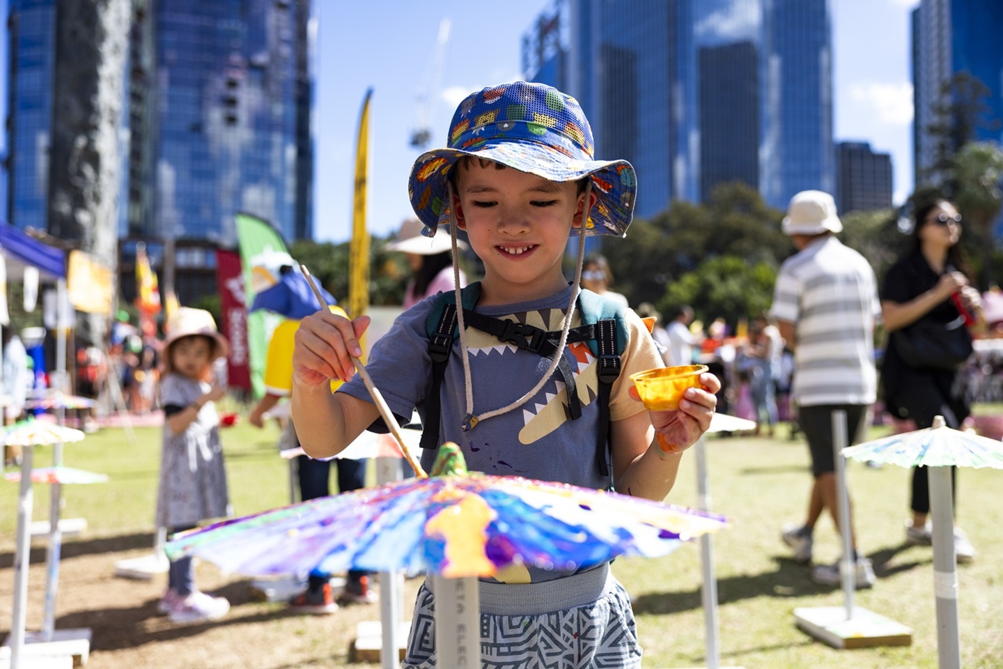 Child at a community event at Supreme Court Gardens