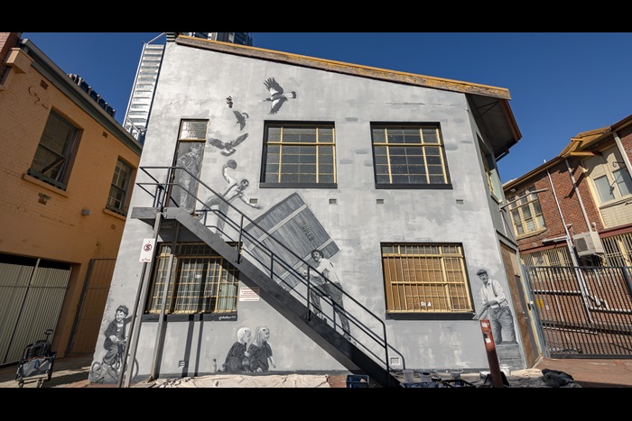 Mural by Jacob 'Shakey' Butler in Wolf Lane